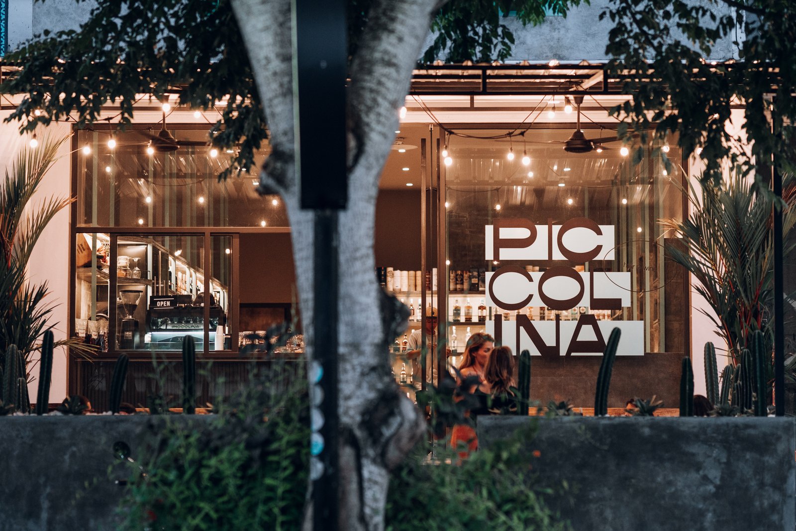 Piccolina storefront in Uluwatu at dusk