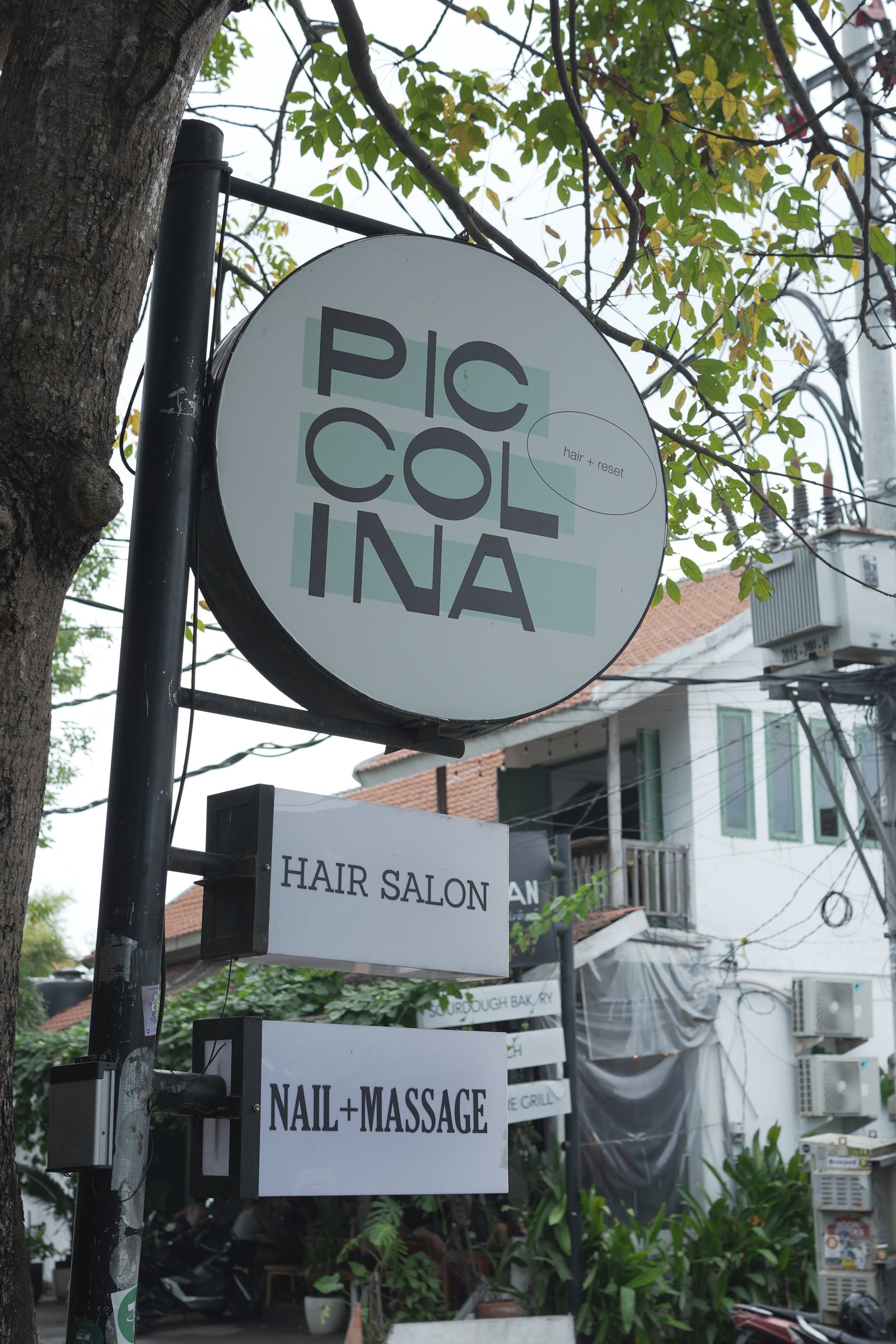 Piccolina hair + reset street sign
